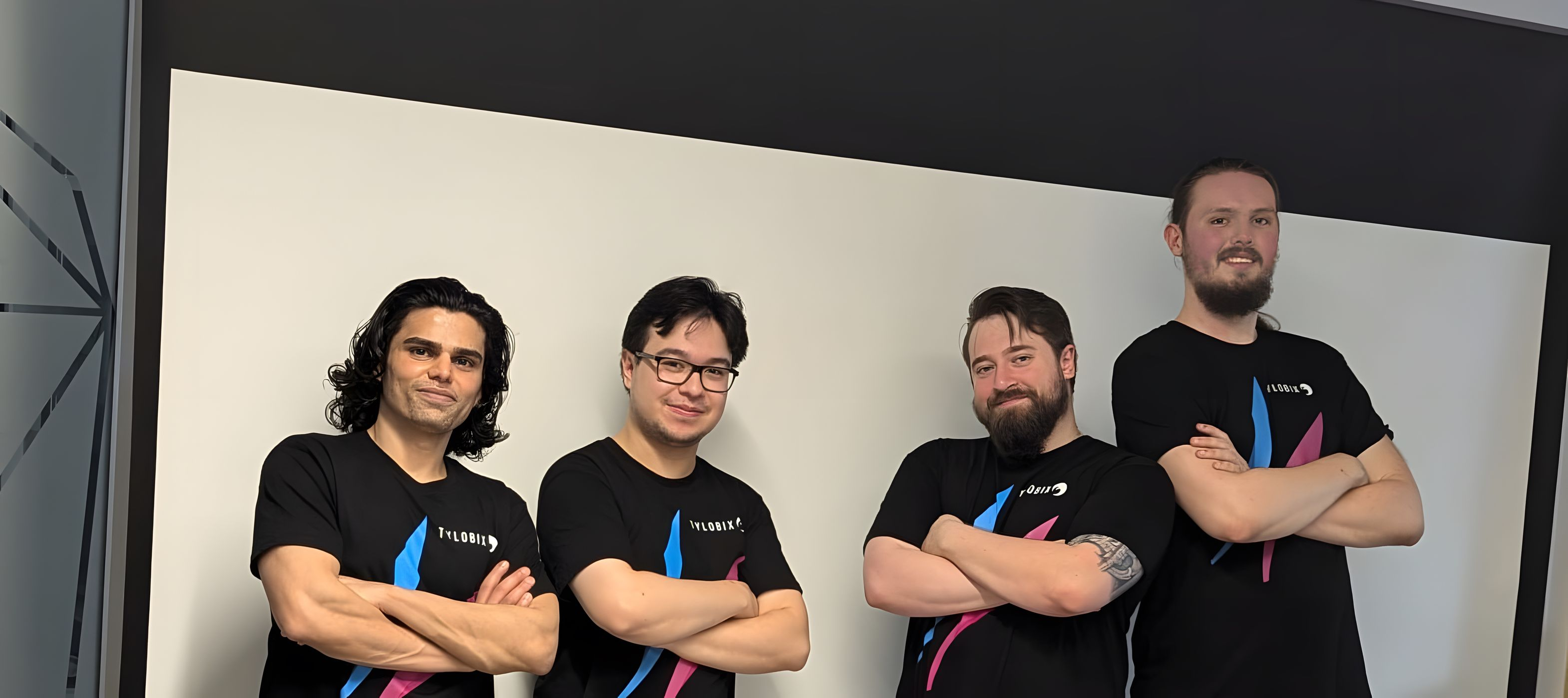 This image shows four team members of Tylobix